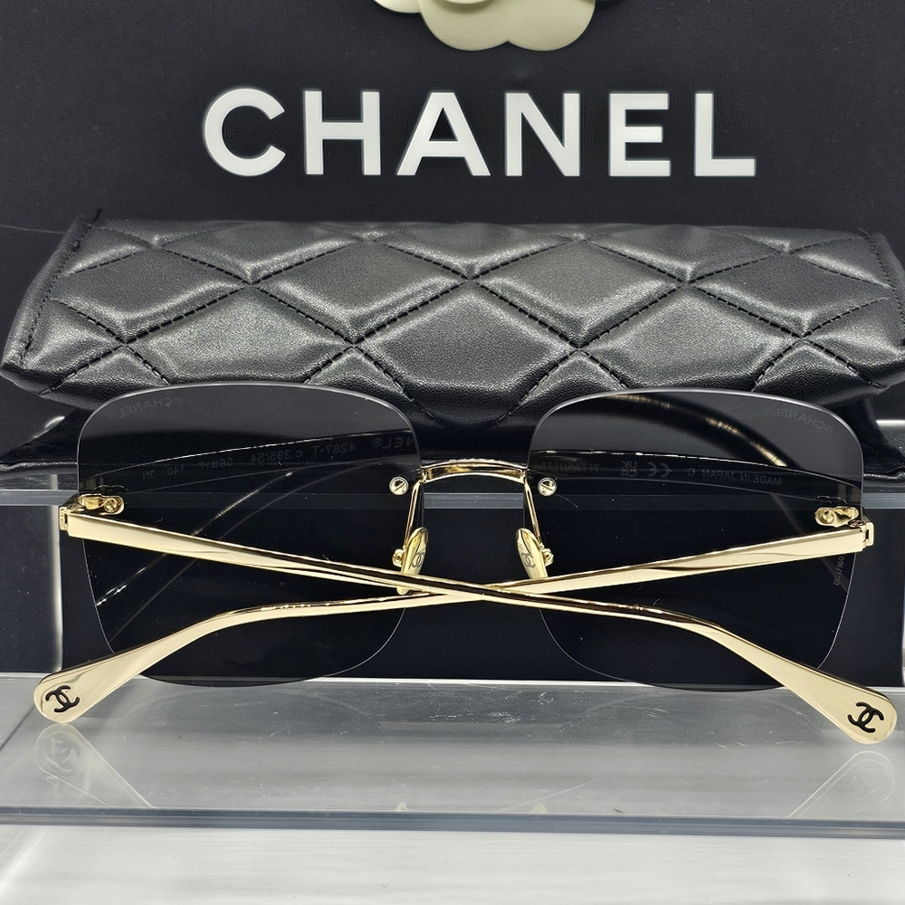 CHANEL Gold and Black Sunglasses